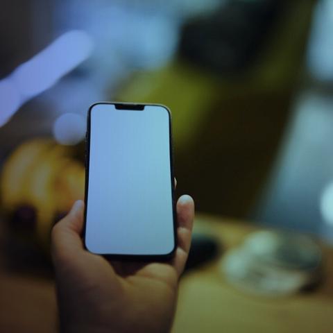 A smartphone held in one hand