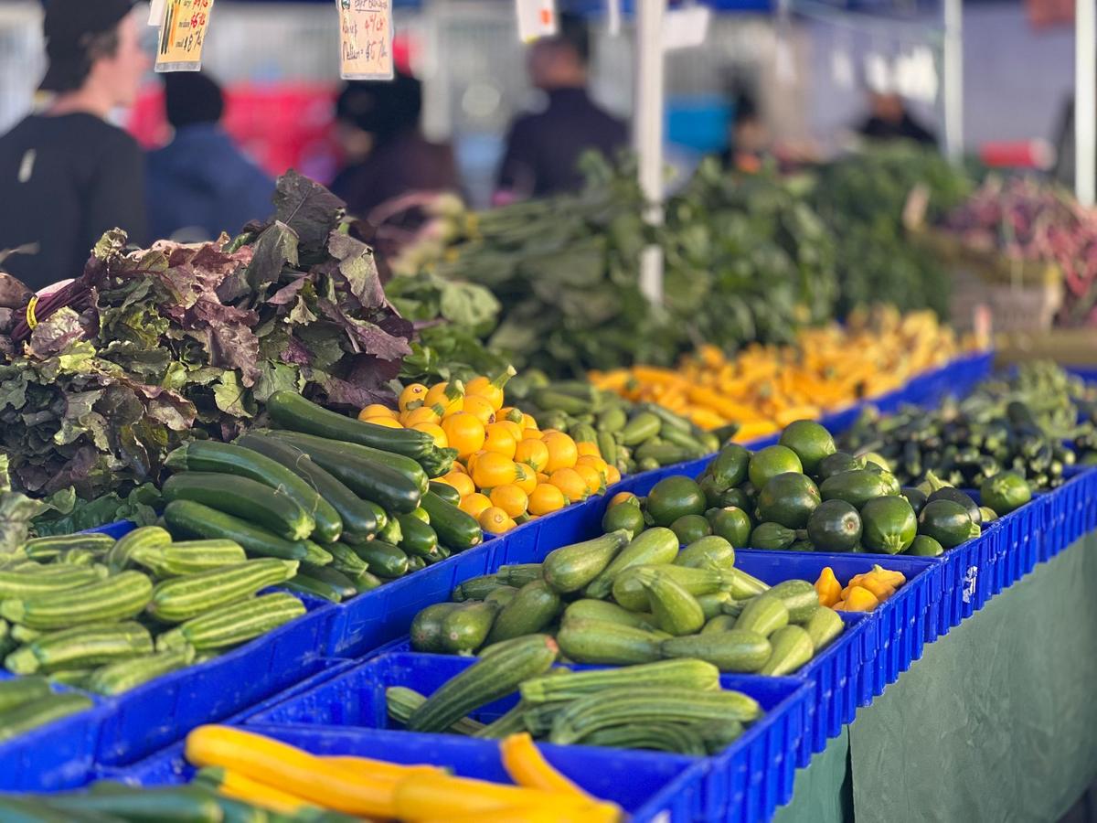 Farmers’ market stall with fresh vegetables